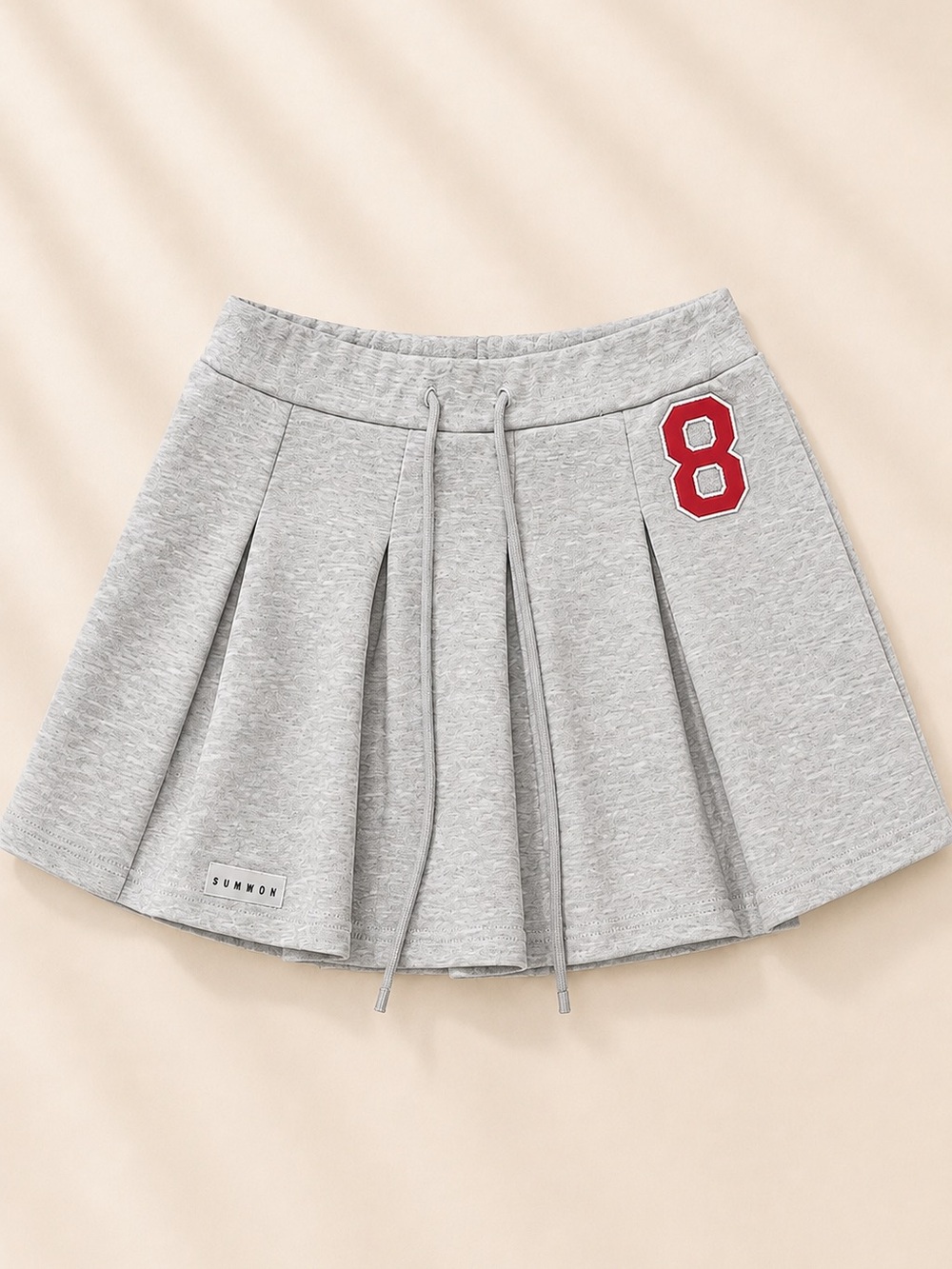 Gray Pleated Drawstring Mini Skirt with Red '8' Accent